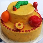A healthy birthday party cake- whole wheat carrot, orange cake featuring The Very Hungry Caterpillar on carrot frosting (Fiesta Fridays- #8)